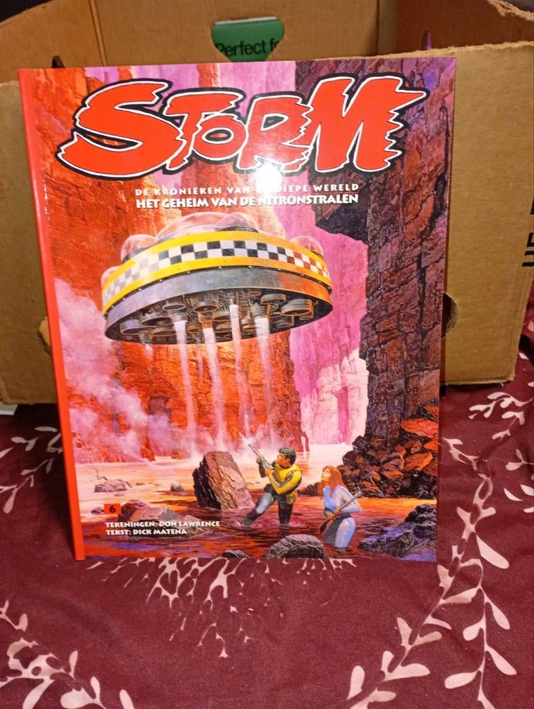 Couverture souple en couleur non lue de la série, STORM,, Une BD, Enlèvement ou Envoi, Comme neuf, Don Lawrence