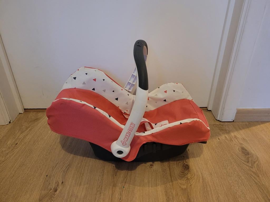 Poppen maxicosi, Ophalen