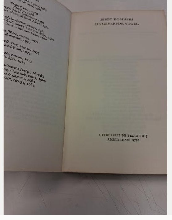 Jerzy Kosinski - De geverfde vogel (1975), Boeken, Literatuur, Gelezen, Ophalen of Verzenden