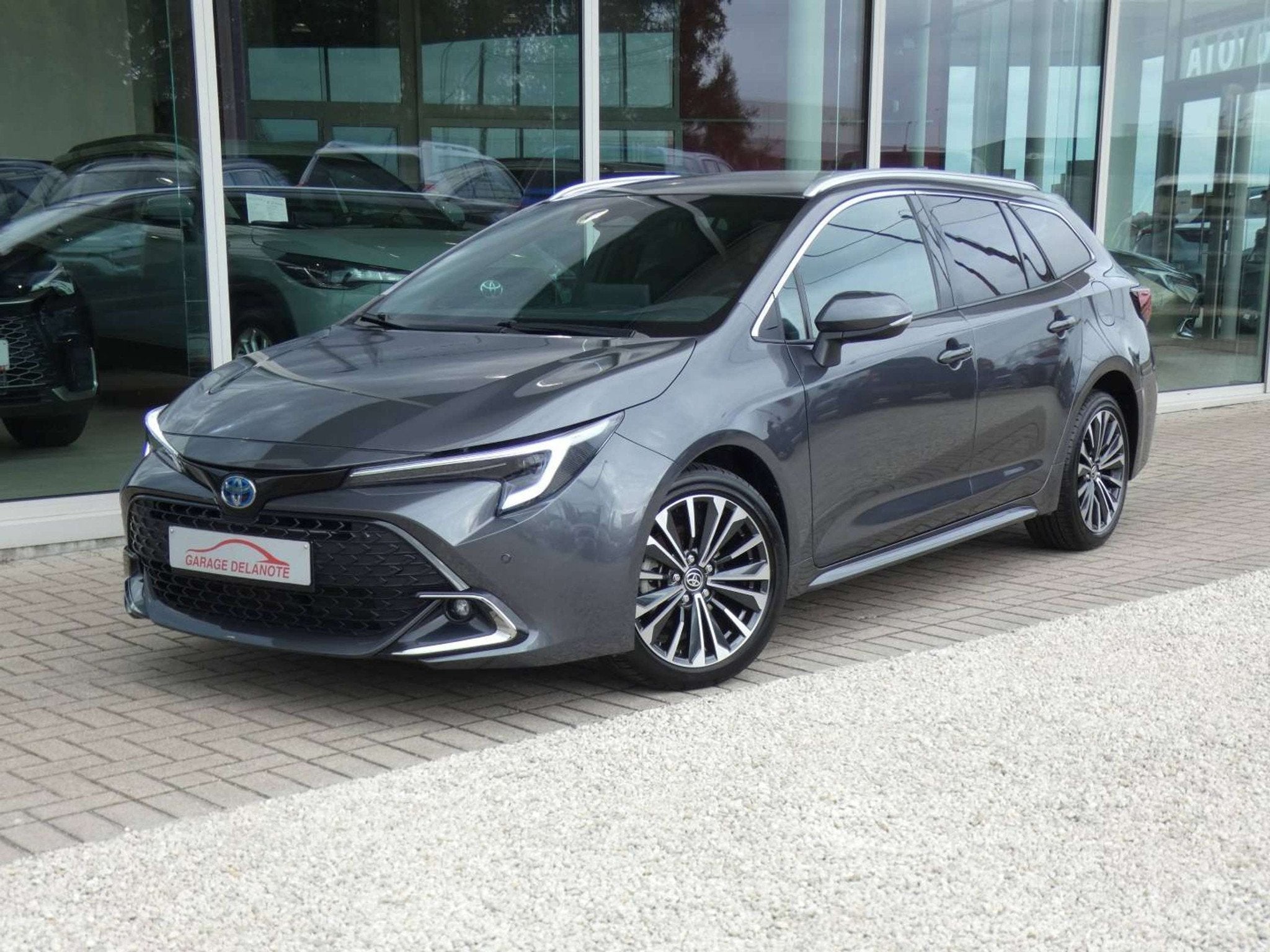 Toyota Corolla 1.8 Hybrid STYLE+TECH PACK 140pk +Elektrische, Auto's, Gebruikt, Zwart, 4 cilinders, Corolla