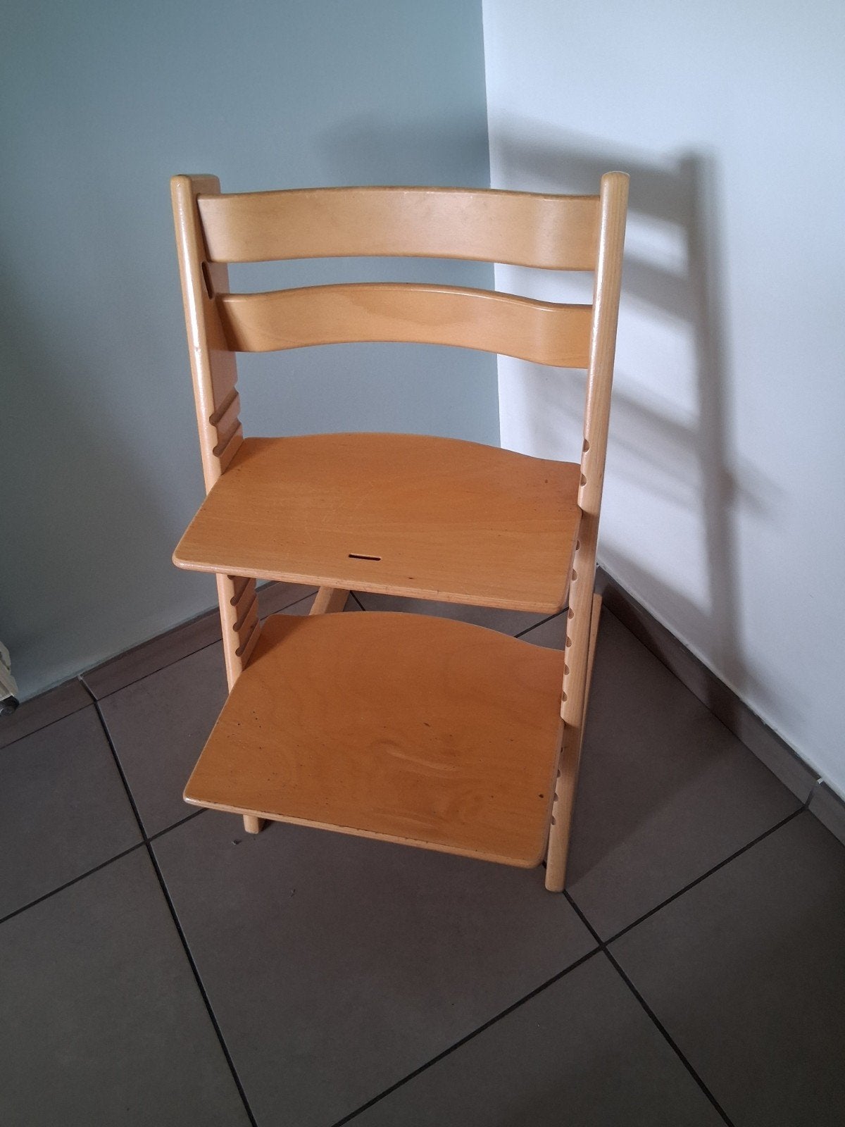 Tripptrapp stoel met beugel, Ophalen