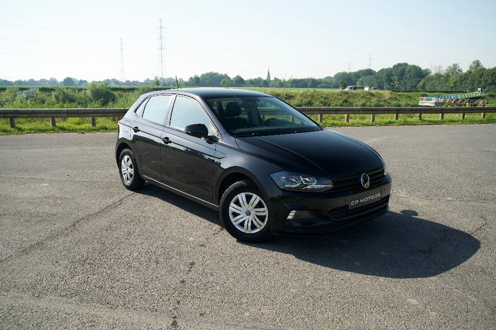 VOLKSWAGEN POLO 1.0i | AIRCO | CARPLAY | PDC | 1E EIGENAAR, Voorwielaandrijving, Stof, https://public.car-pass.be/vhr/fe615b4e-fd9d-4342-abf8-cc4256f99771