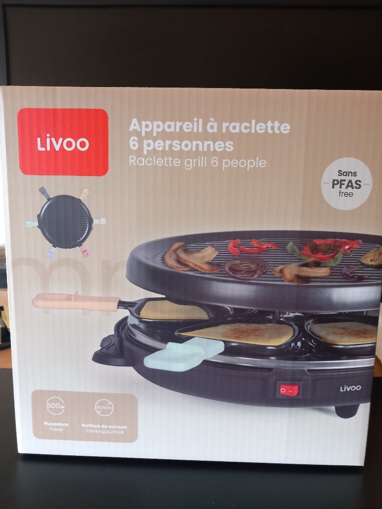 Nieuw raclette toestel met kaas waardebonnen, Ophalen