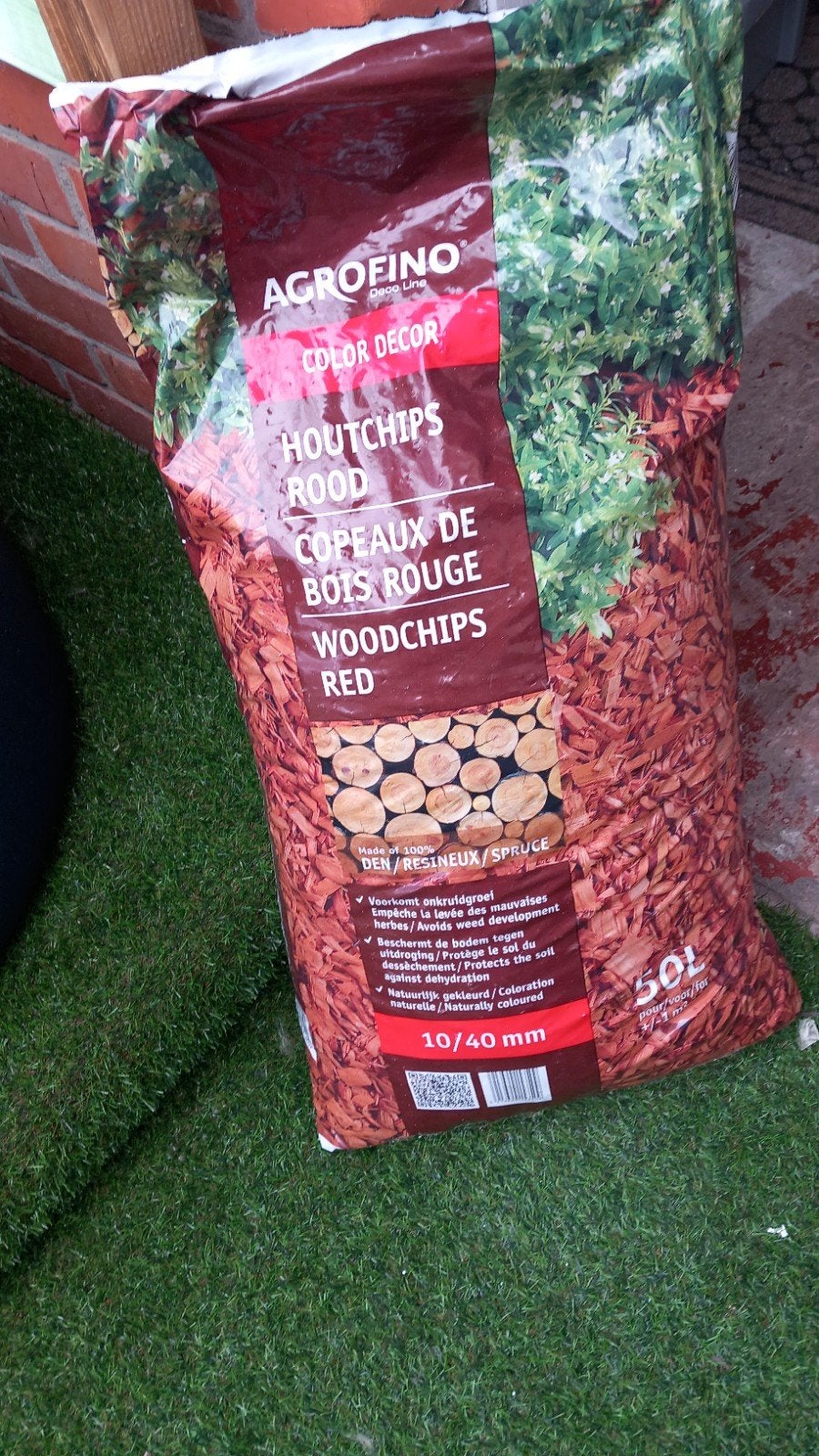 1 zak houtchips rood, Enlèvement
