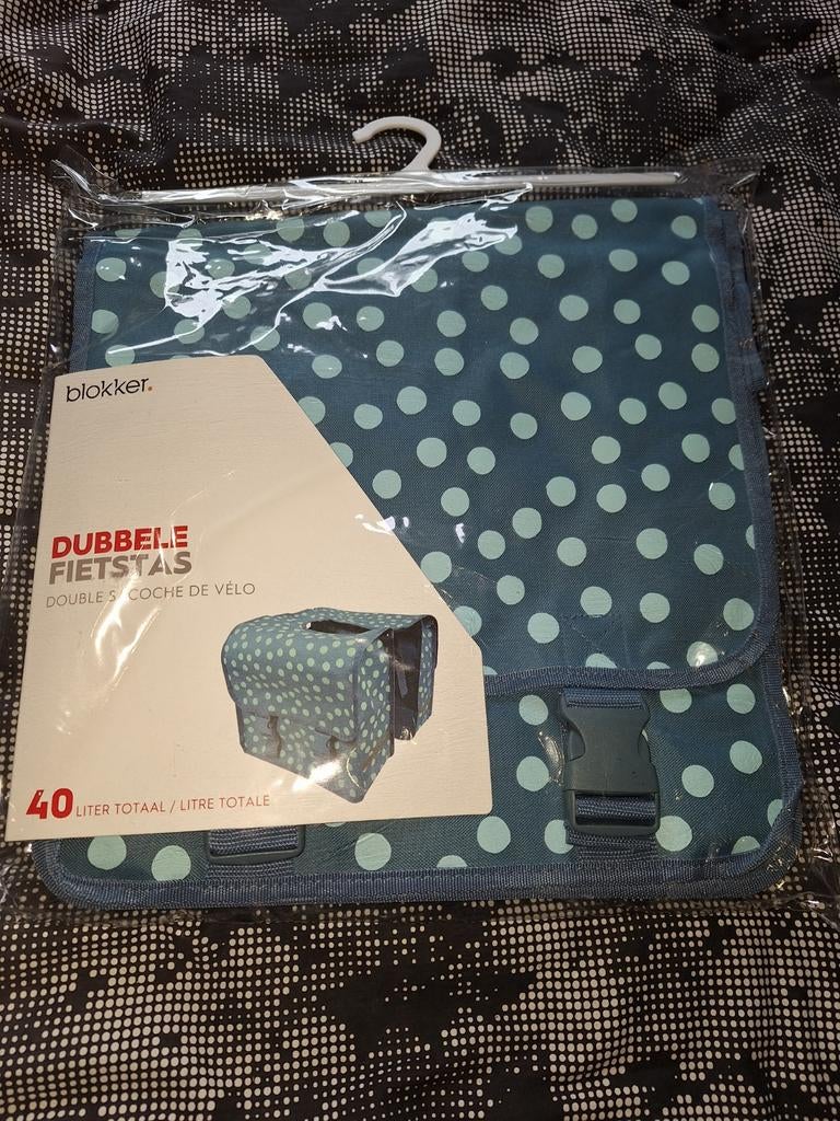 Dubbele fietstas 40 liter, Ophalen