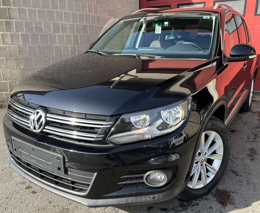 Volkswagen Tiguan 1.4 TSI + CUIR + NAVI (bj 2014), Auto's, 90 kW, Euro 5, 122 pk, Gebruikt