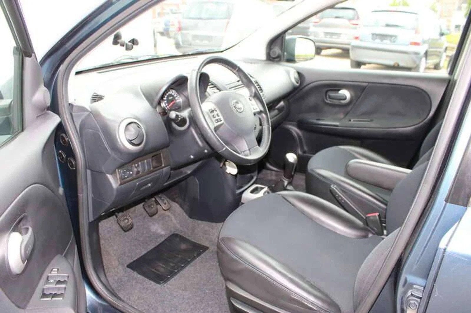 Nissan Note 1.4i Airco/Cruise inclusief 2 JAAR garantie!, Auto's, Nissan, Euro 5, Zwart, 4 cilinders, 65 kW