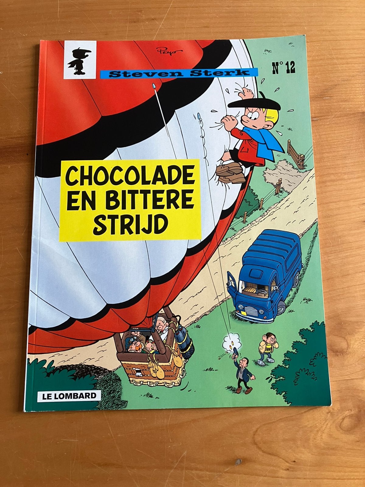 Steven Sterk nr 11 -Chocolade en bittere strijd - 1e d 2002., Boeken, Eén stripboek, Ophalen of Verzenden, Zo goed als nieuw