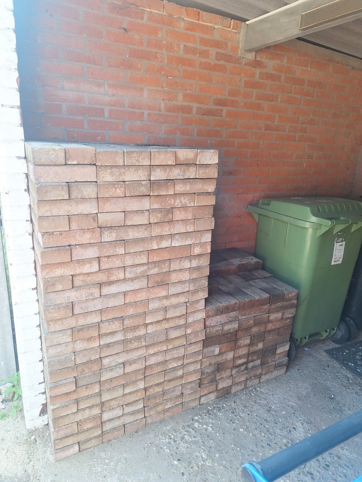 20m² klinkers uitgebroken en proper, Enlèvement