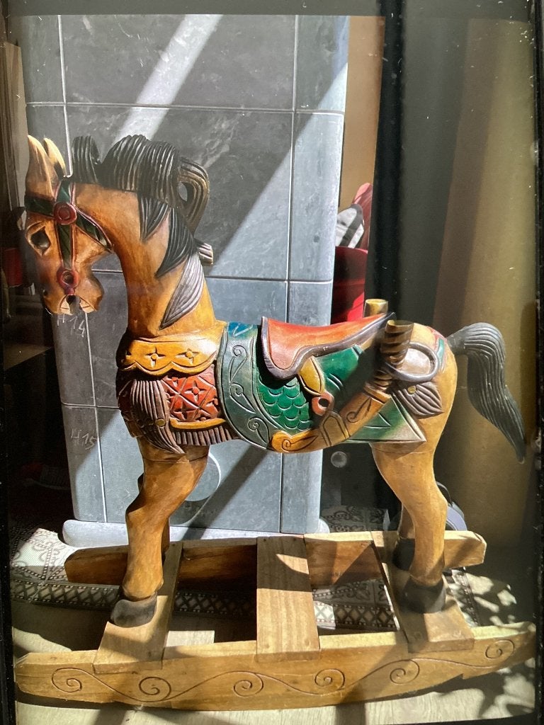 Massief houten schommelpaard, Ophalen
