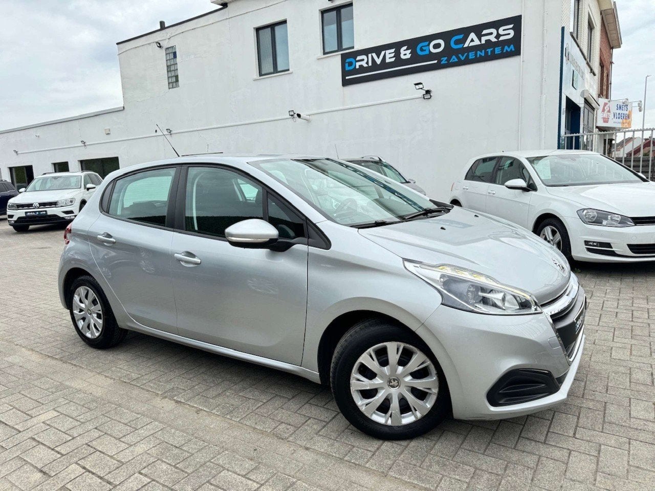Peugeot 208 1.2i Benzine | Airco | Navigatie | Cruis Control, Auto's, Stof, Gebruikt, 1199 cc, Bedrijf