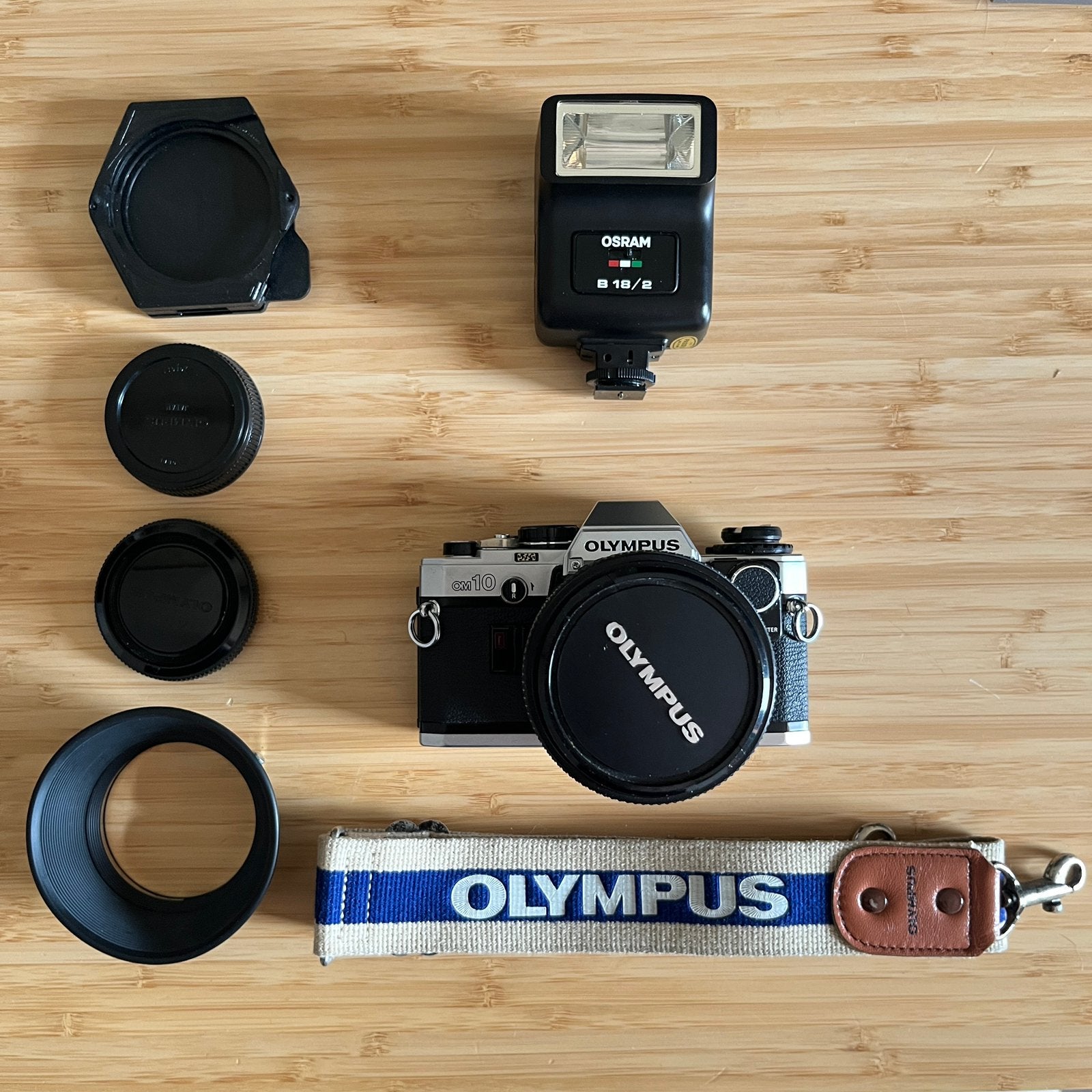 Olympus OM-10 + handmatige adapter+ Zuiko 35-70mm f/4, Audio, Tv en Foto, Ophalen of Verzenden, Zo goed als nieuw, Olympus