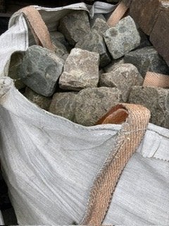 Lot 20m² opgekuiste Belgische porfier kasseien in big bags, Tuin en Terras, Tegels en Klinkers, Ophalen