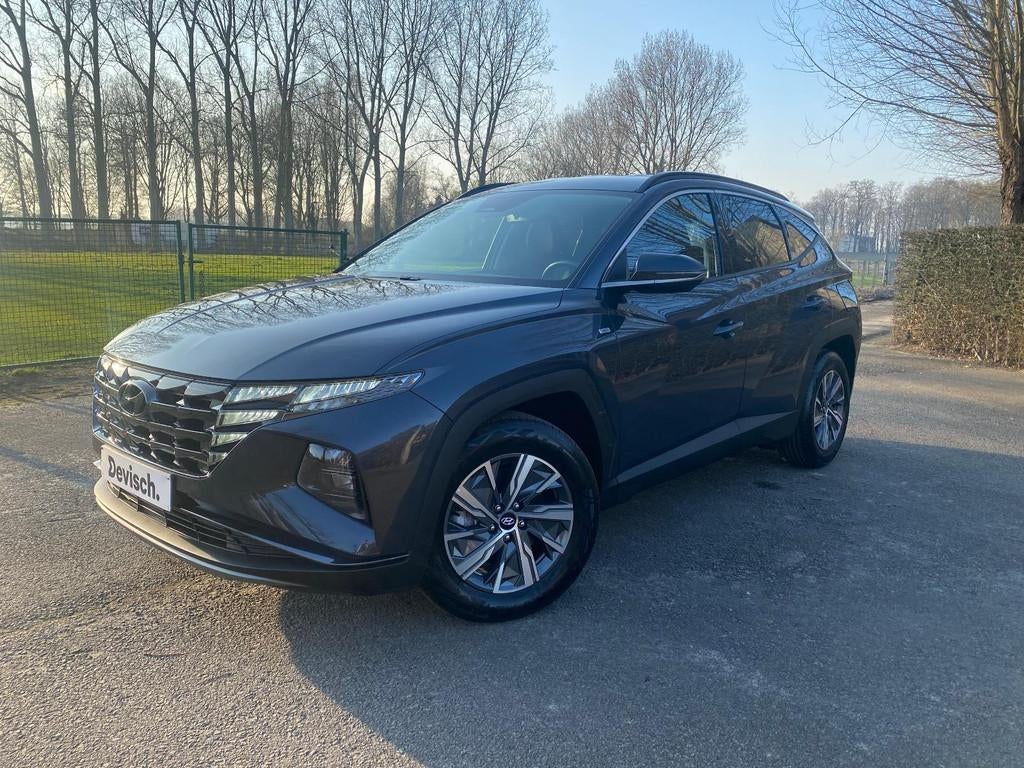 Hyundai Tucson 1.6 T-GDi DCT LIMITED EDITION MILD HYBRID 48V, Auto's, Stof, Gebruikt, 4 cilinders, Parkeersensor
