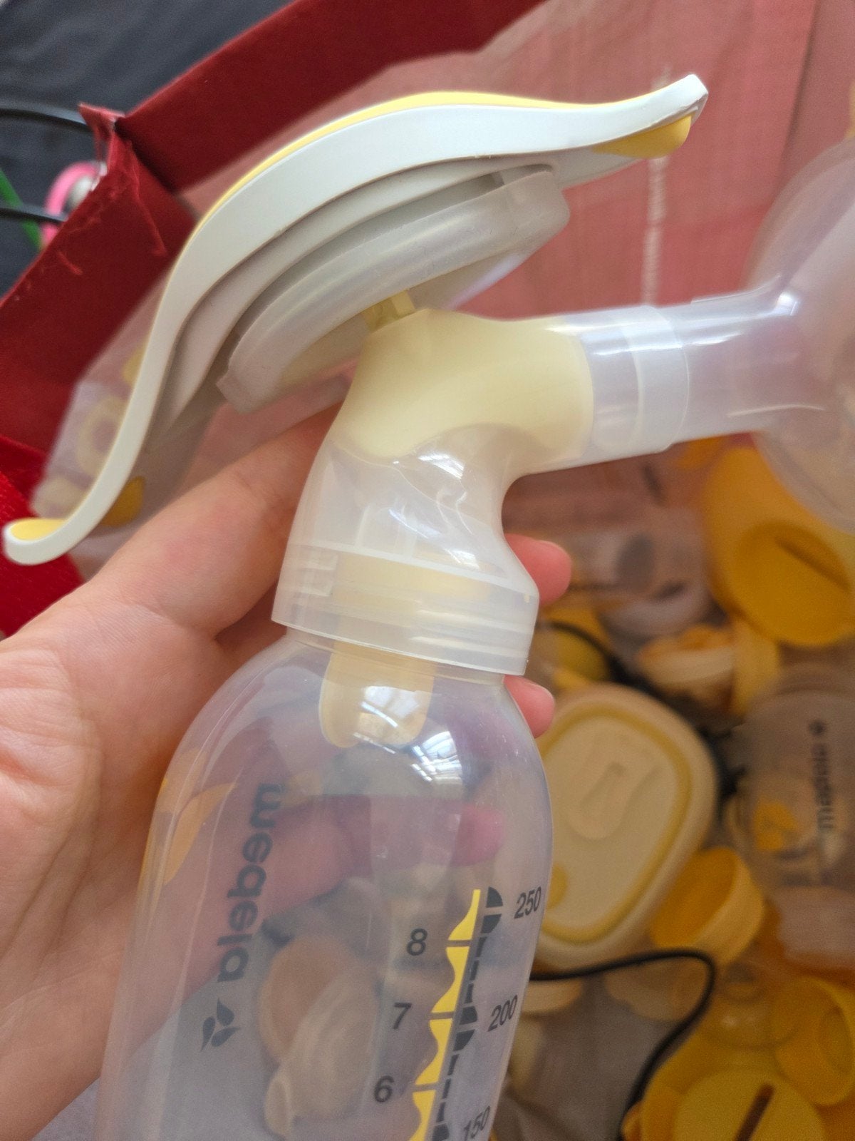 Handmatige borstkolf van Medela en kolfapparaat, Ophalen, Gebruikt, Medela, Borstkolf