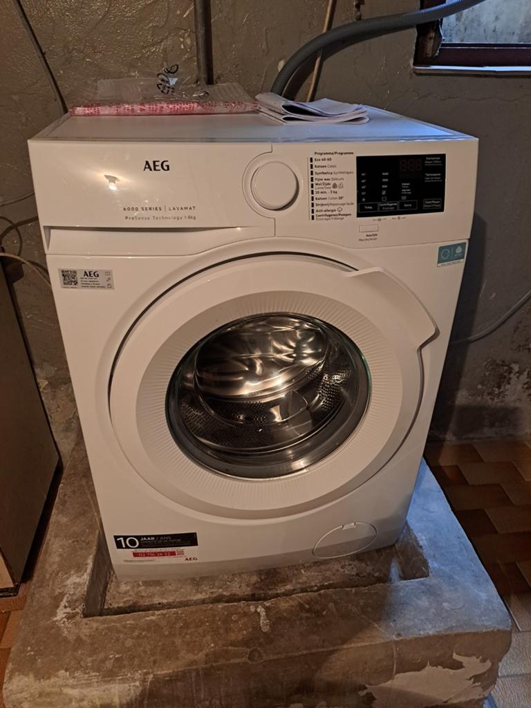 AEG wasmachine met 1 jaar garantie, Ophalen, Zo goed als nieuw, Voorlader, Energieklasse A of zuiniger