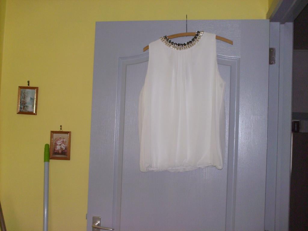 a vendre blouse tunique pour dame, Kleding | Dames, Blouses en Tunieken, Star monde, Ophalen of Verzenden, Zo goed als nieuw, Overige kleuren