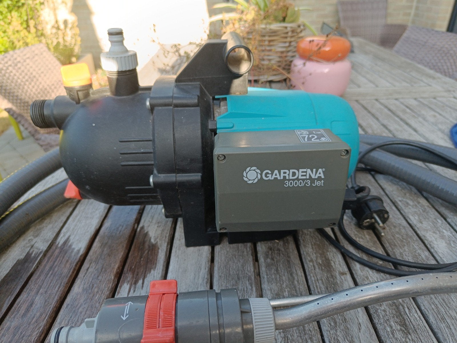 Gardena waterpomp met aanzuigslang en sproeier, Ophalen