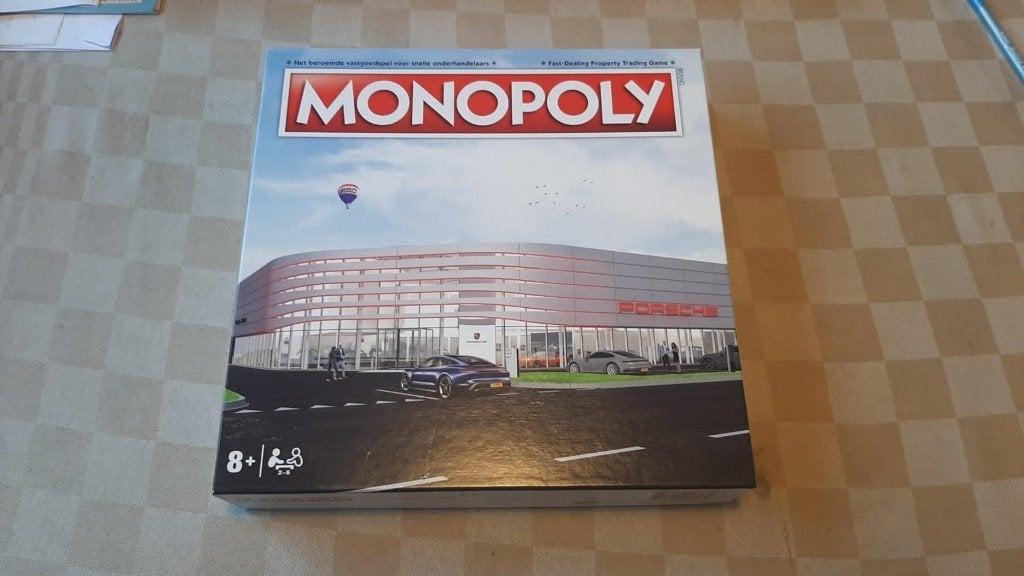 contenu du jeu de société seal car Monopoly Porsche Monopoly, Hobby & Loisirs créatifs, 1 ou 2 joueurs, Enlèvement ou Envoi, Neuf