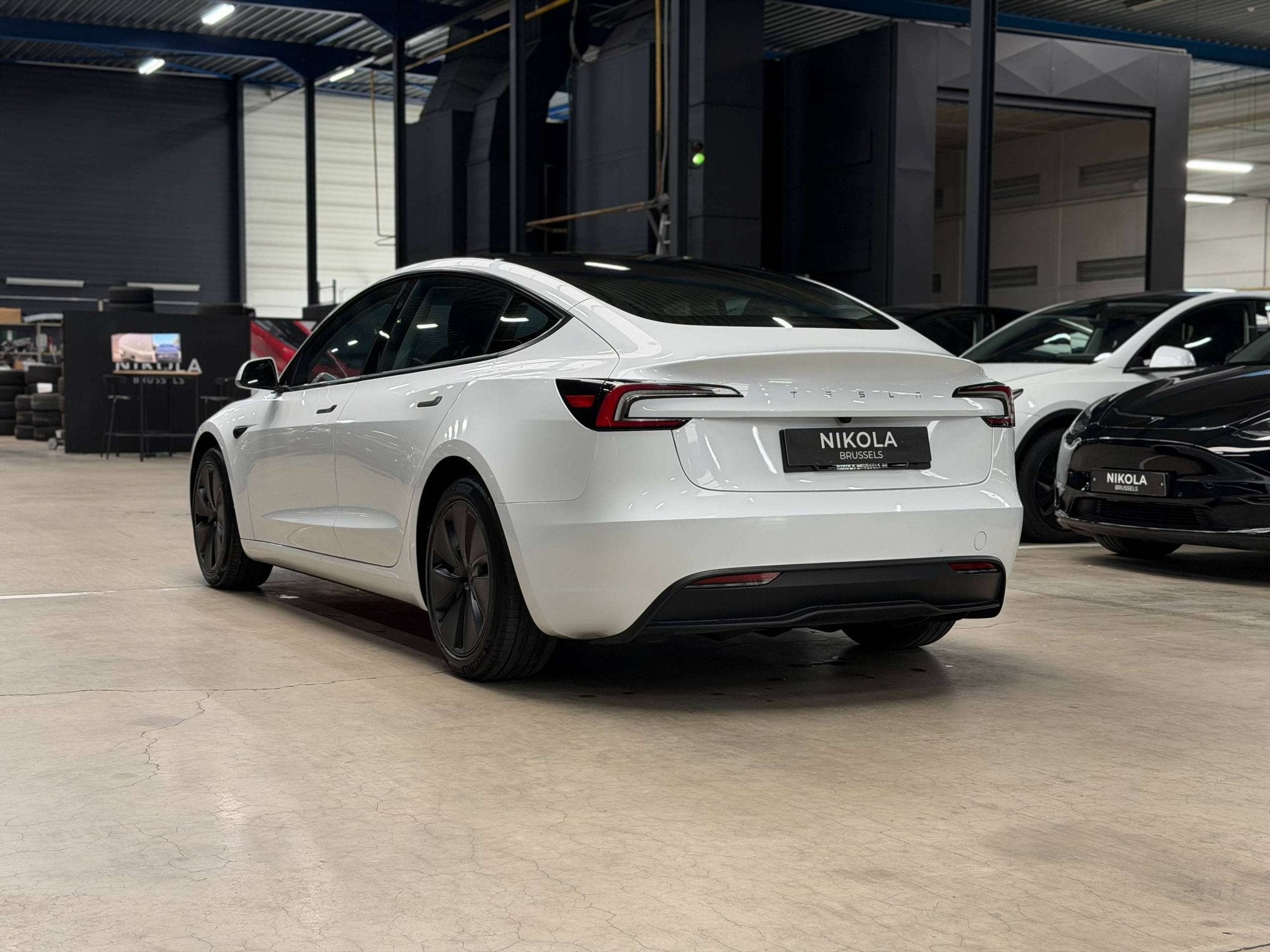 Tesla Model 3 REAR WHEEL DRIVE - HARDWARE 4 - HIGHLAND PREMI, Auto's, Achterwielaandrijving, Gebruikt, Zwart, 192 kW