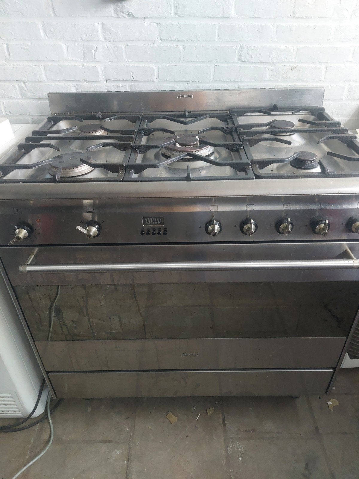Fornuis smeg heel proper en werkt perfect 280 €, Ophalen of Verzenden
