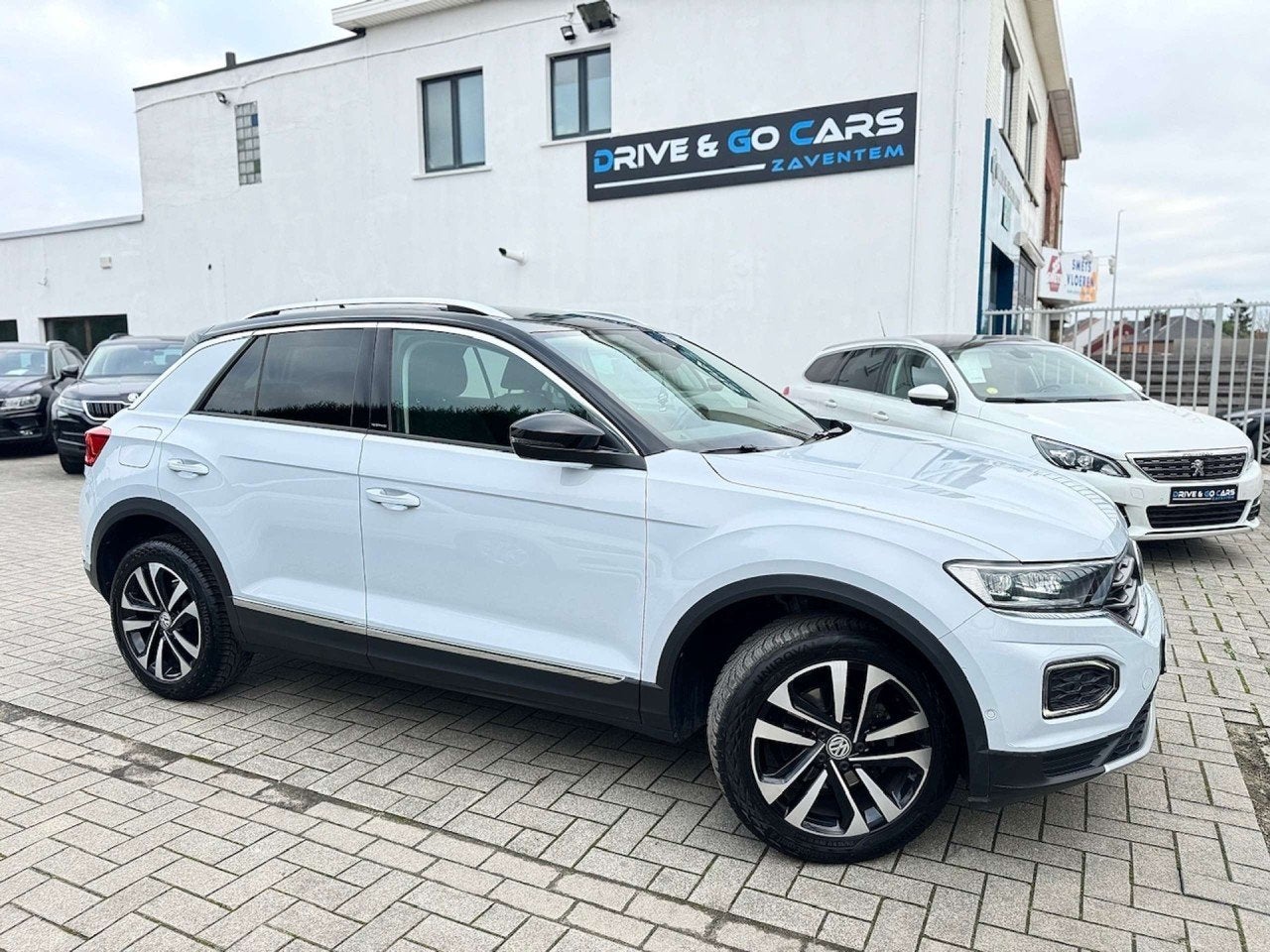 Volkswagen T-Roc 1.0 TSI OPF IQ.DRIVE * 1 JAAR GARANTIE * !, Voorwielaandrijving, Stof, Gebruikt, Wit
