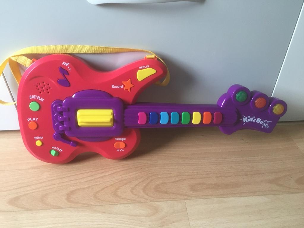 Speelgoed gitaar elektronisch voor kinderen in nieuw staat, Ophalen, Zo goed als nieuw, Elektronica, Met licht