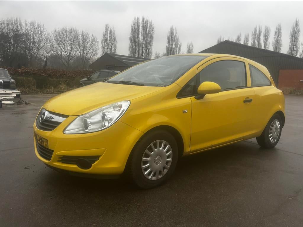 OPEL CORSA 1.0BENZINE VAN 2010 MET 65000DKM 12 GARANTIE, Auto's, Voorwielaandrijving, Stof, Zwart, Overige kleuren