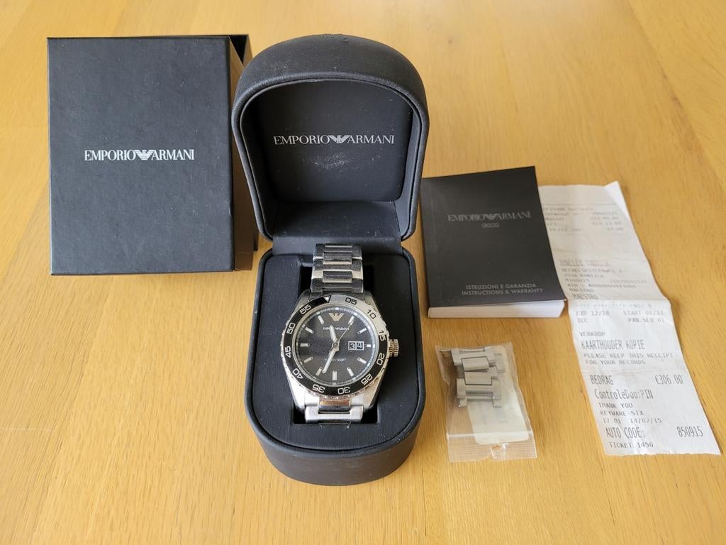 Armani heren horloge, Ophalen