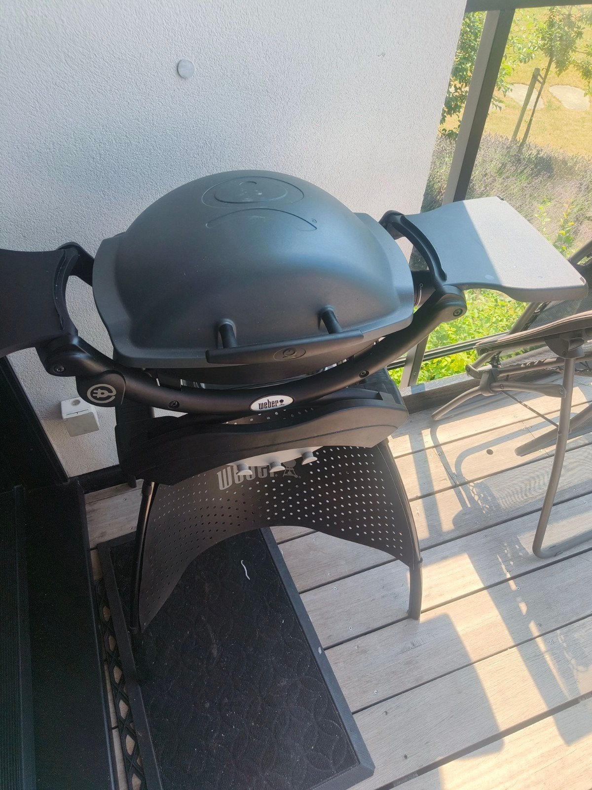 Weber q1400 met onderstel, Ophalen