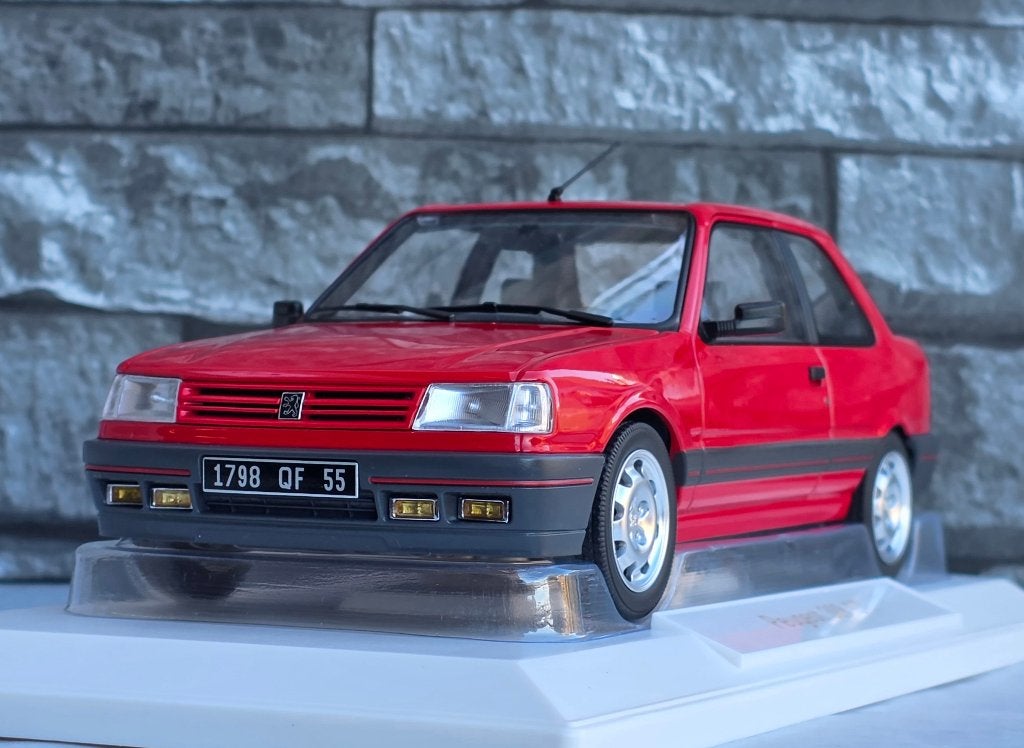 Peugeot 309 GTi 1987 Rouge Vallelunga 1/18ème, Hobby en Vrije tijd, Auto, Norev, Ophalen of Verzenden, Norev