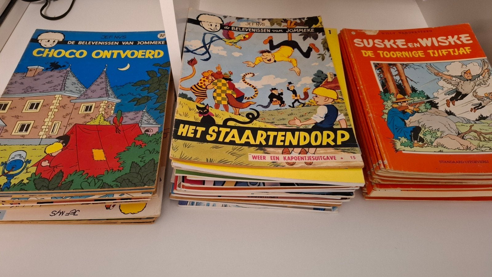 Strips Jommeke en Suske en Wiske, Ophalen