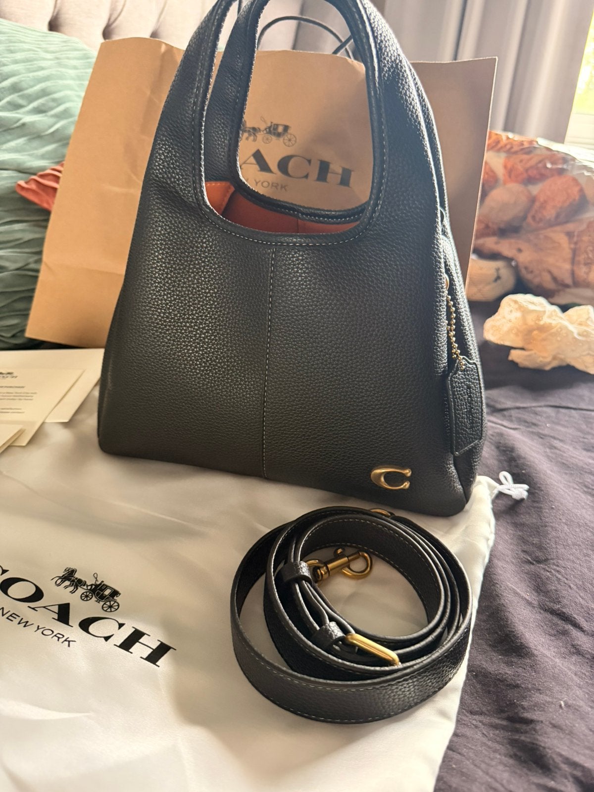 Coach lana 23, Ophalen, Zo goed als nieuw