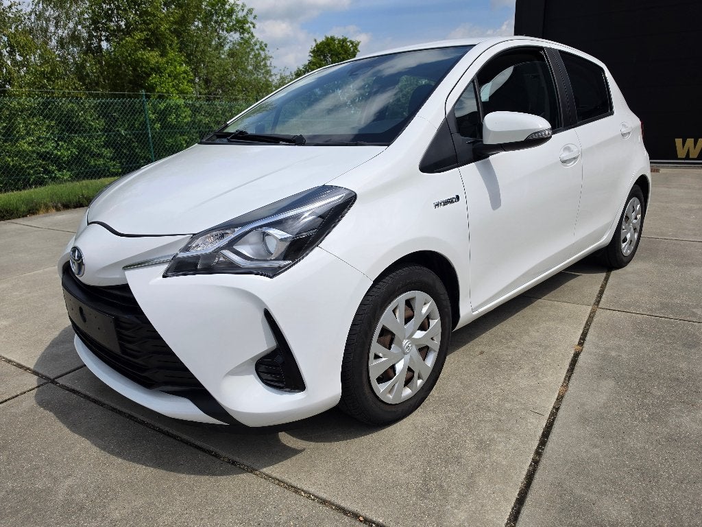 Toyota Yaris 1.5 Hybrid Comfort Navi 37.000 km + Garantie, Auto's, Automaat, 1497 cc, Navigatiesysteem, Wit