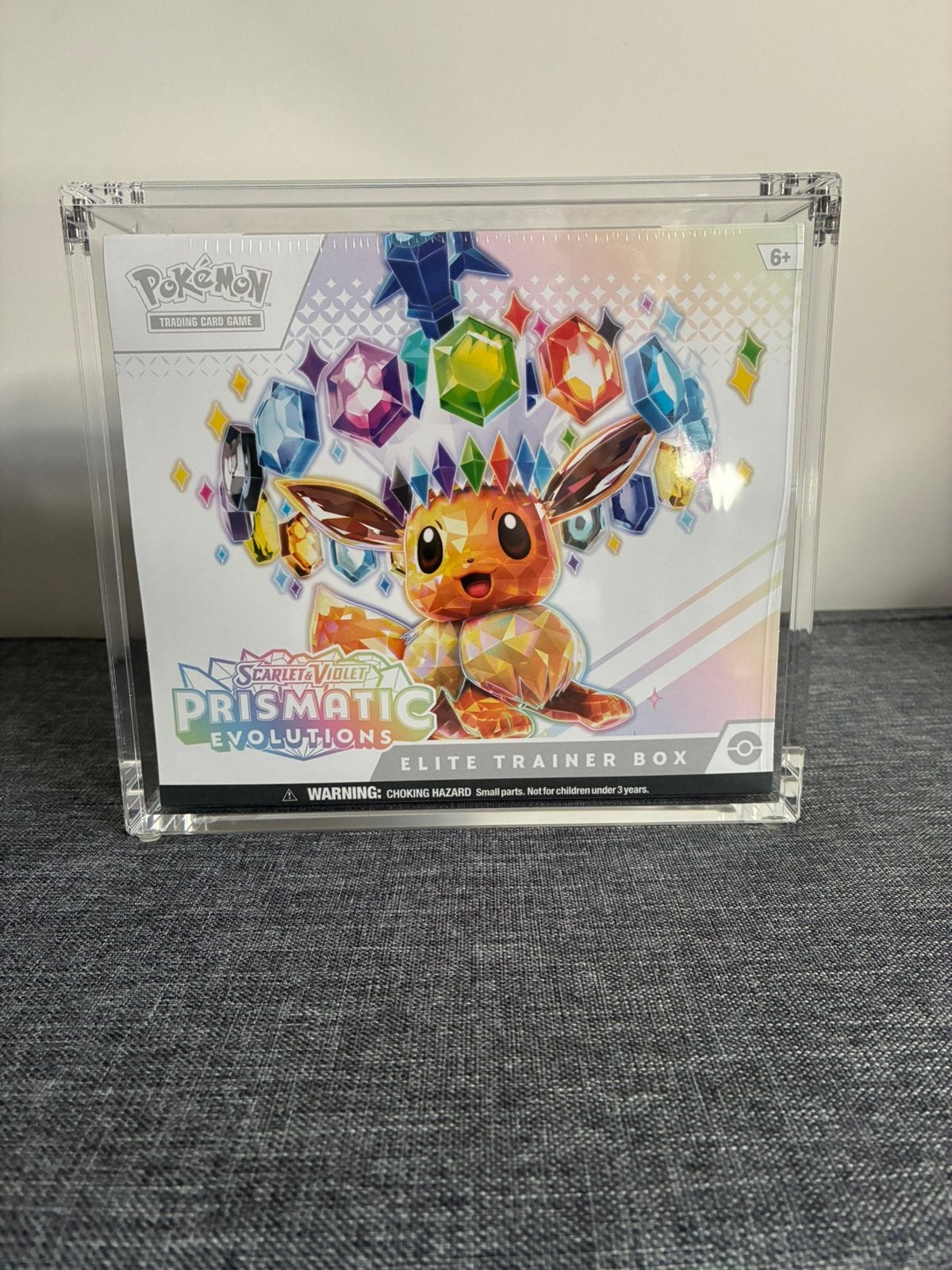 Prismatic Evolutions ETB + acryl, Ophalen of Verzenden, Zo goed als nieuw