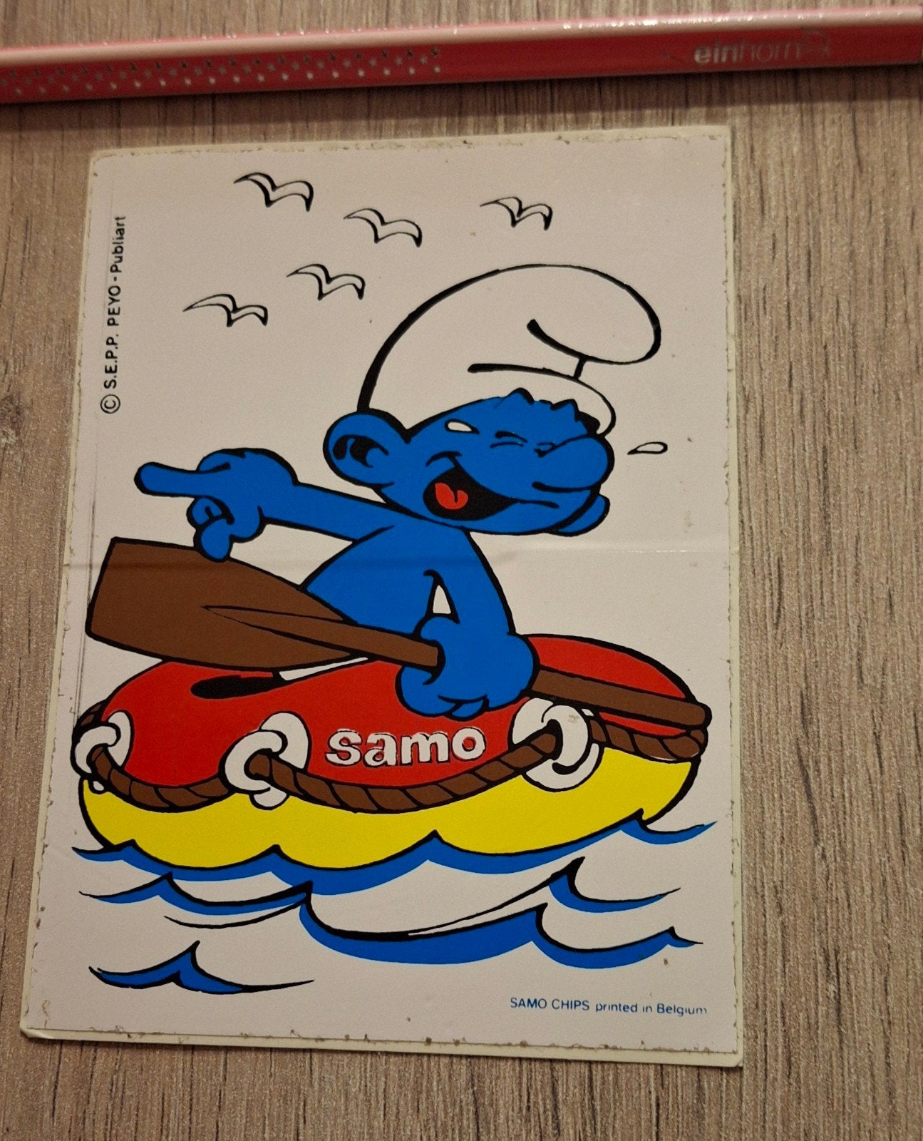 sticker smurf in roeiboot Samo verzameling, Ophalen of Verzenden, Zo goed als nieuw, Strip of Tekenfilm