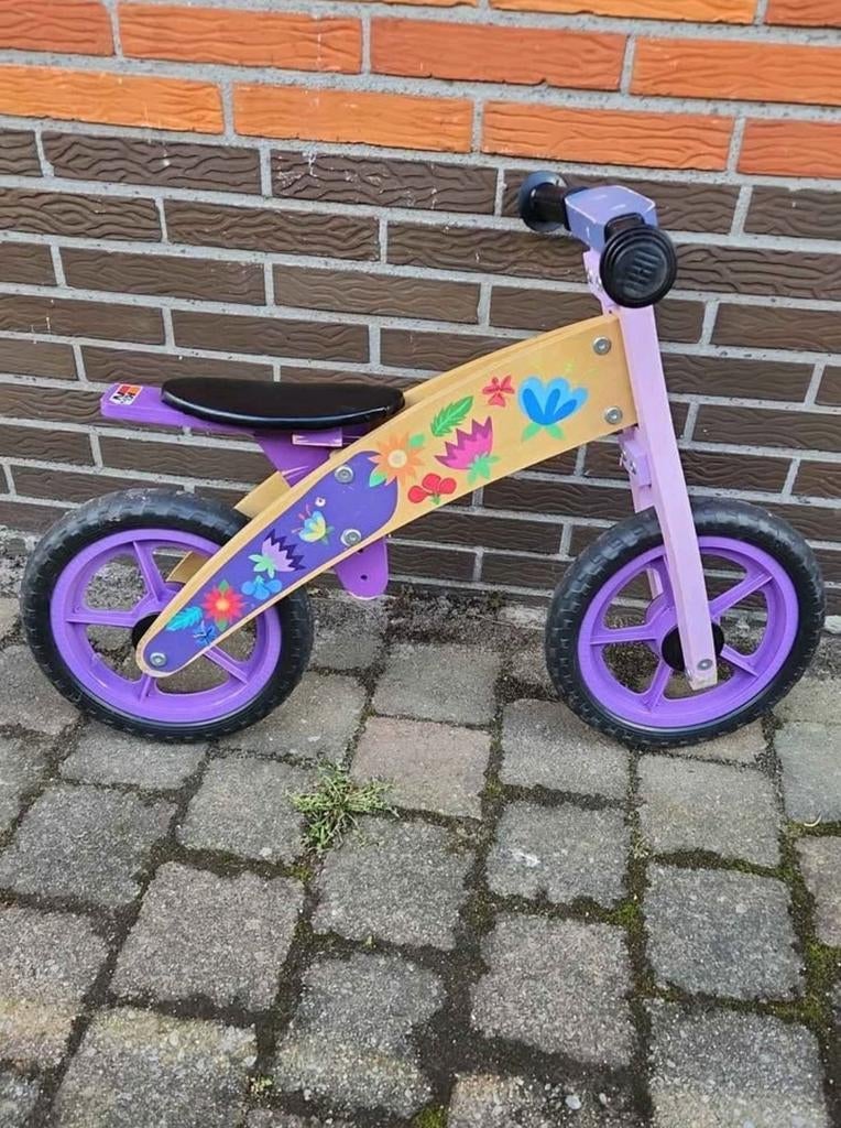 Houten loopfietsje, Ophalen