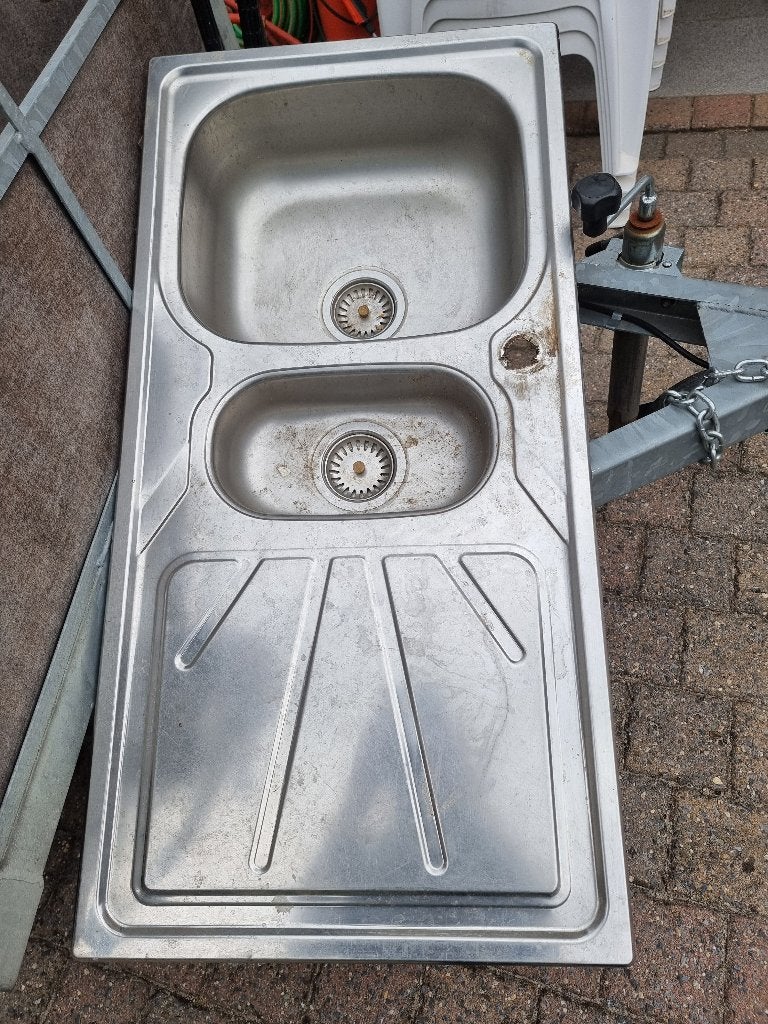 Inox spoelbak, Ophalen
