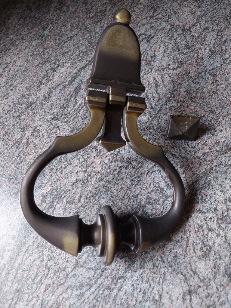 Bronzen deurklopper, Ophalen, Brons