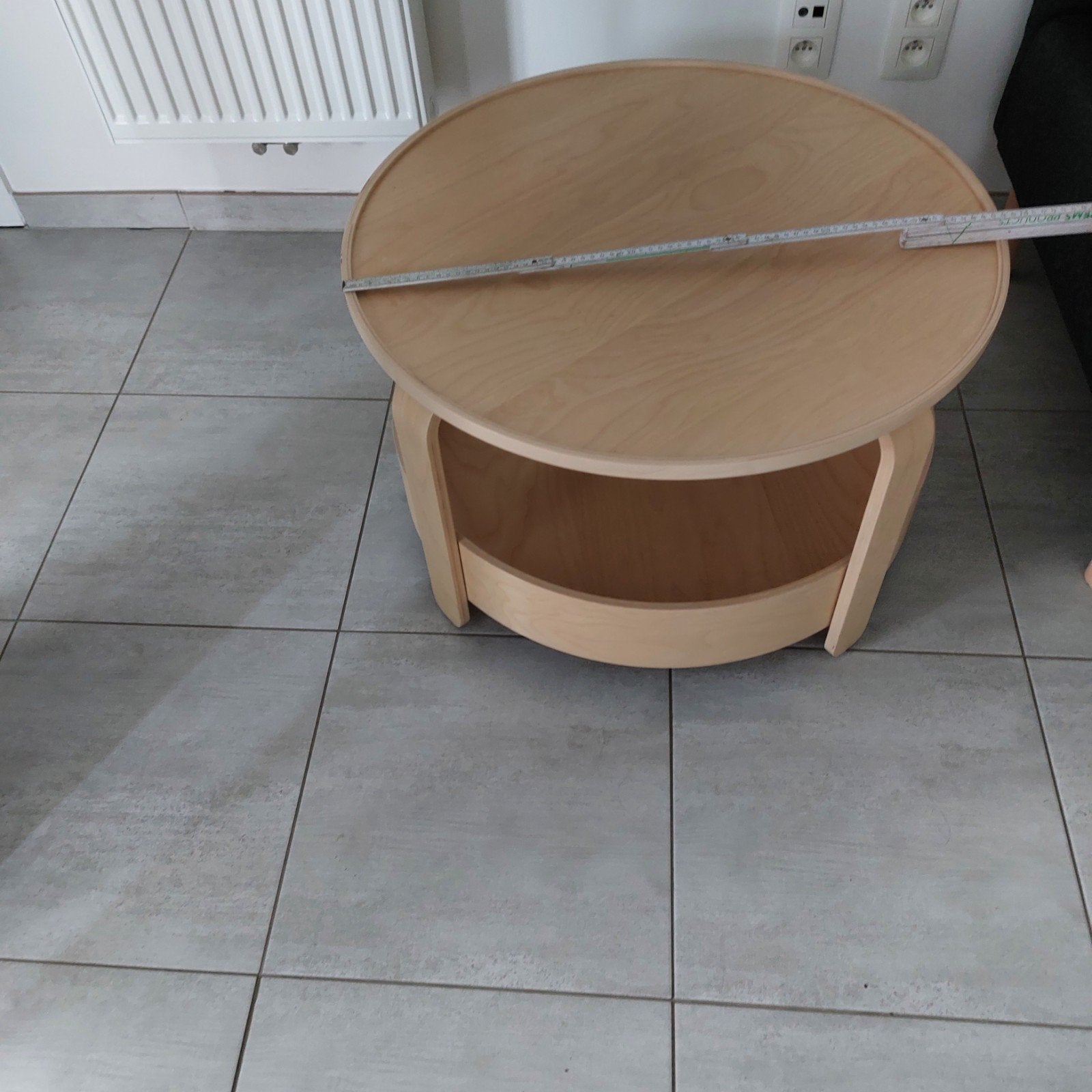 ronde houten salontafel, Ophalen