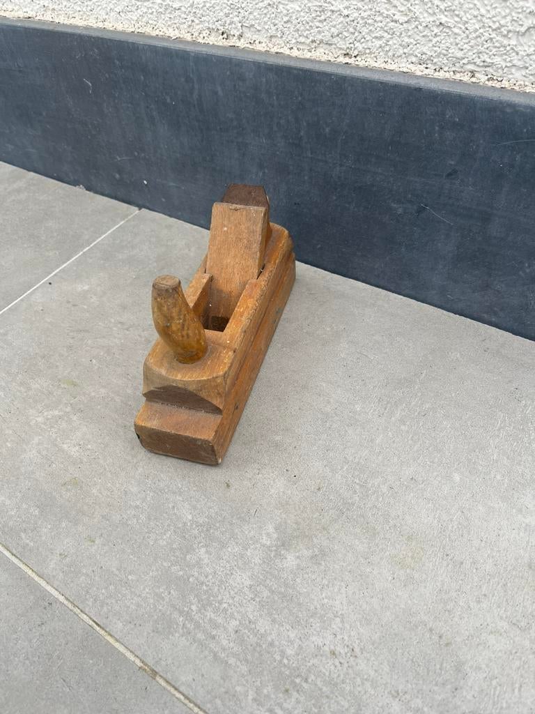 Kleine houten schaaf, Ophalen