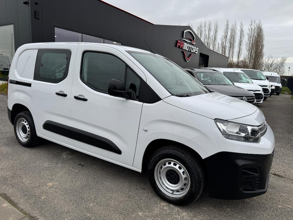 Citroen Berlingo 1.2 benzine 1ste eig ohboek 35.000km, Auto's, Bestelwagens en Lichte vracht, Voorwielaandrijving, Stof, 1199 cc