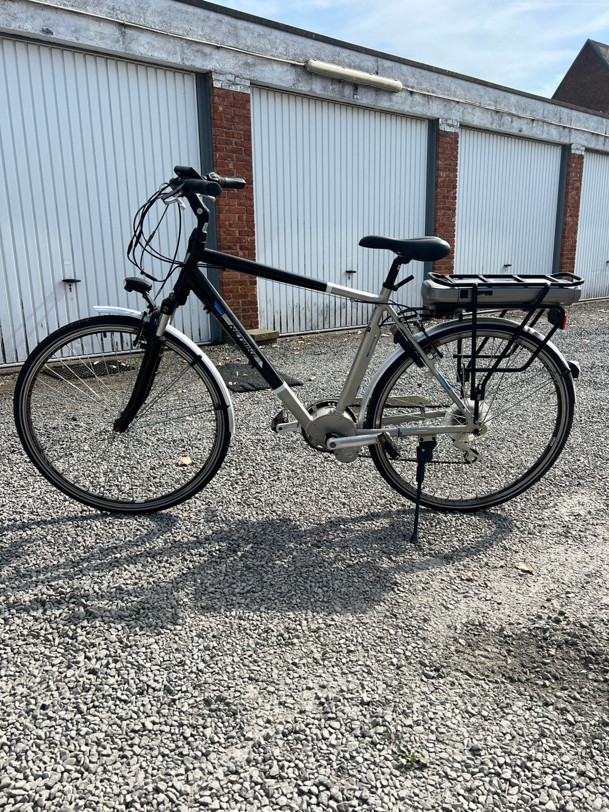 Elektrische heren fiets minerva met middenmotor, Ophalen, Zo goed als nieuw