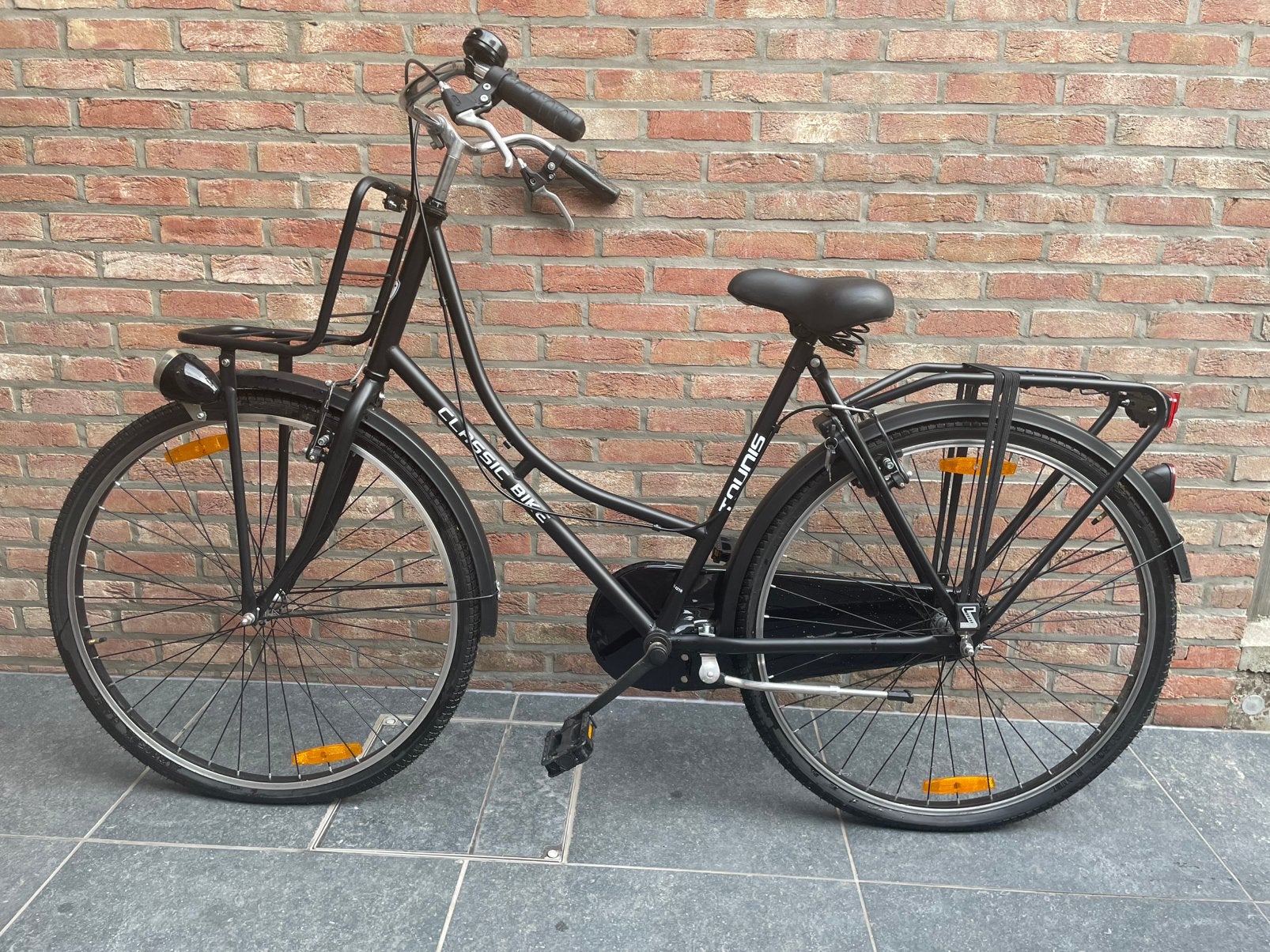 Damesfiets 28” in mat zwart merk Tounis, Fietsen en Brommers, Ophalen, Zo goed als nieuw