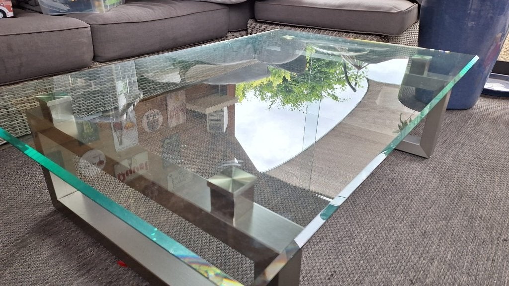 Stijlvolle moderne salontafel - RVS onderstel & dik glas, Ophalen, 100 tot 150 cm, 50 tot 100 cm, Zo goed als nieuw