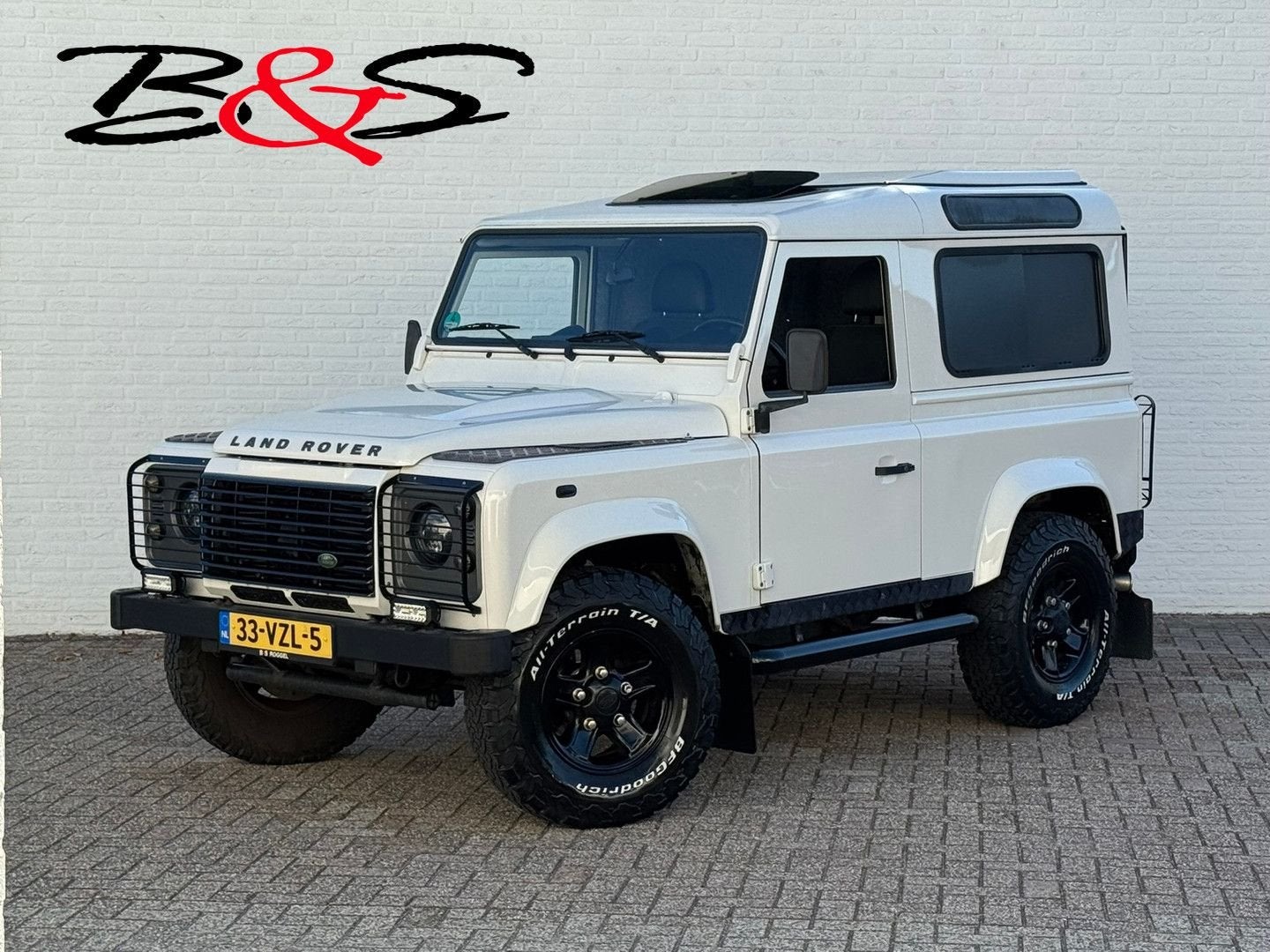 Land Rover Defender 2.4 TD HT 90" E Marge Grijs kenteken Led, Wit, 4x4, SUV of Terreinwagen, Onderhoudsboekje