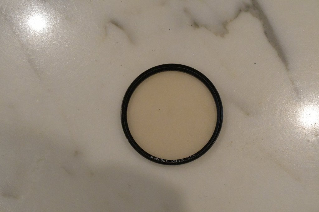 B+W KR 1.5 1.1X 60E UV filter, Inclusief opbergcase, B+W, UV-filter, Ophalen of Verzenden