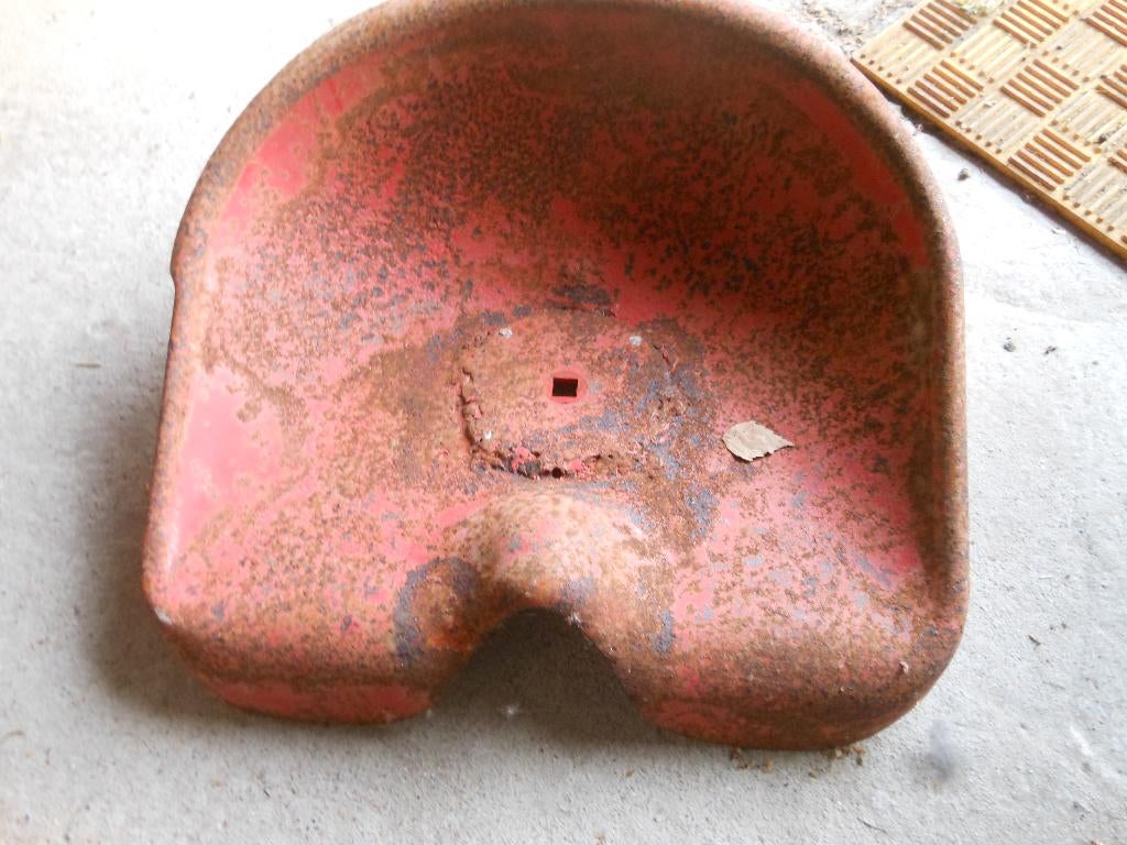 ancien siège de tracteur, Enlèvement