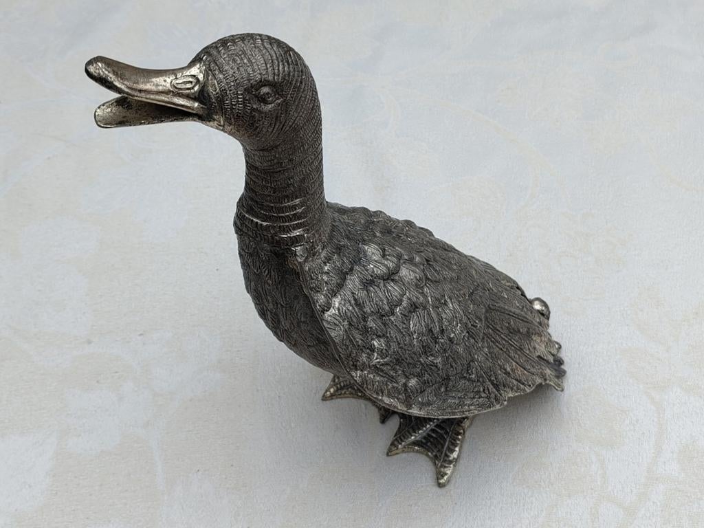 Decoratieve verzilverde eend, Ophalen, Brons