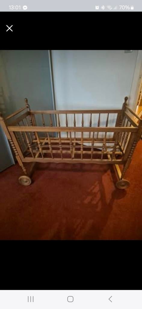 Houten wieg op wielen, Ophalen